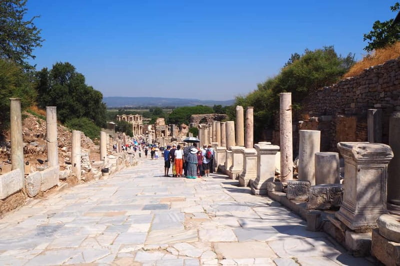 Kusadasi: Ephesus & Temple of Artemis Tour with Entry Ticket - Entering Ephesus: Roman streets, 30+ structures, and chariot-wheel marks